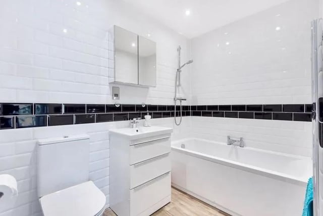 This four bedroom terraced home with views over Camber Dock, Old Portsmouth is on sale for £950,000. This is what the bathroom looks like.