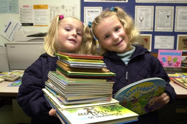 Twins Chelsea and Georgie Leigh are attending an autumn fayre at Sheep Dip Primary School in 2001.