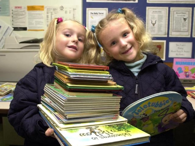 Twins Chelsea and Georgie Leigh are attending an autumn fayre at Sheep Dip Primary School in 2001.
