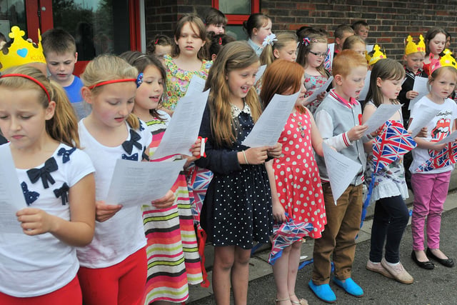 Community singing during the Brougham Primary School Jubilee party. It's another scene from 2012.