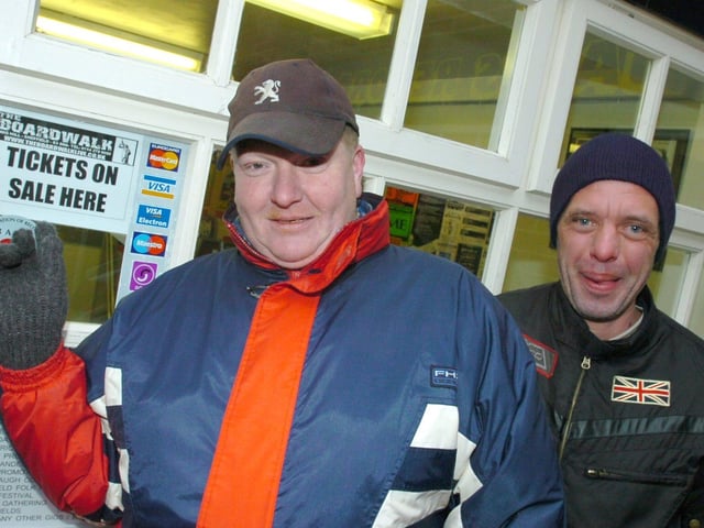 Arctic Monkeys fans Neil Crofts and Darren Bradley, right, queing for tickets at Jacks Records in 2006
