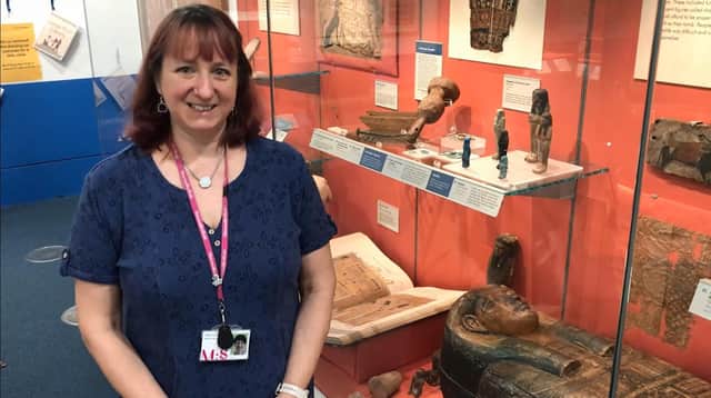 Curator of Archaeology, Martha Lawrence in the Ancient Egypt gallery at Weston Park Museum