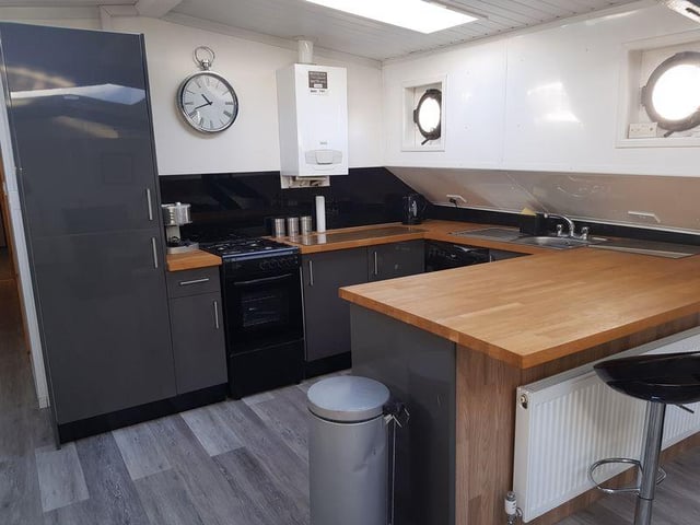 This three-bed houseboat in Bursledon is on the market for £169,950.