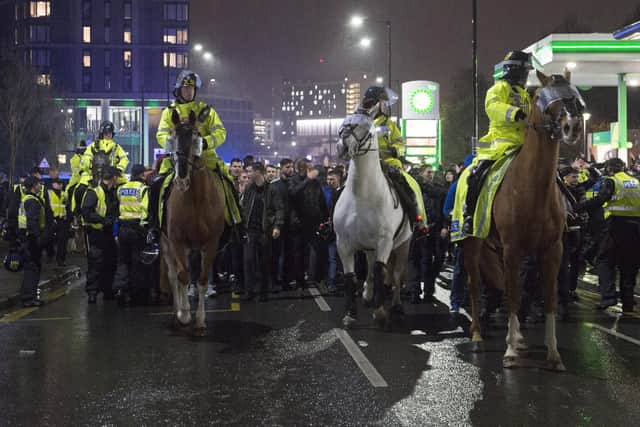 File photo. Police escort Owls fans on Bramall Lane during the 130th Steel City Derby in 2018.