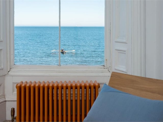 New owners can enjoy the seaside views from the master bedroom.