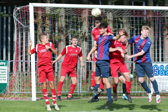 Horndean (red) v US Portsmouth in the Under-18s Hampshire Combination East Division. Picture: Chris Moorhouse