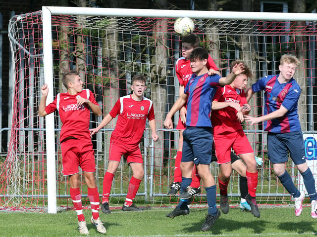 Horndean (red) v US Portsmouth in the Under-18s Hampshire Combination East Division. Picture: Chris Moorhouse
