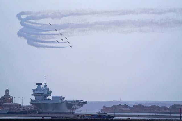The Red Arrows perform a flying display over Portsmouth Harbour. Picture: Andrew Matthews/PA Wire