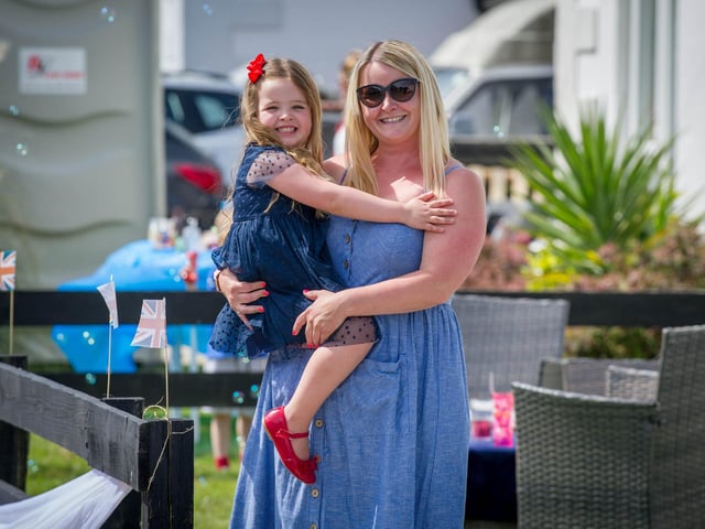 Lisa Dooler with her daughter Willow 4 outside their home during VE Day celebrations in Peronne Road, Portsmouth.