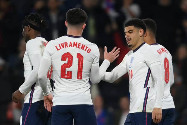Sheffield United's on-loan midfielder Morgan Gibbs-White celebrates after scoring their side's third goal with Valentino Livramento during the UEFA European Under-21 Championship Qualifier match between England U21 and Andorra U21: Mike Hewitt/Getty Images