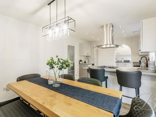 This is the dining area within the open-plan kitchen. A pleasant spot to enjoy a family meal.