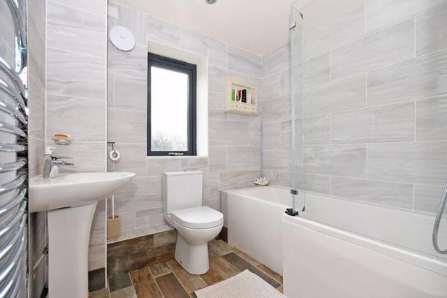 The family bathroom is located on the ground floor, at the front of the property.