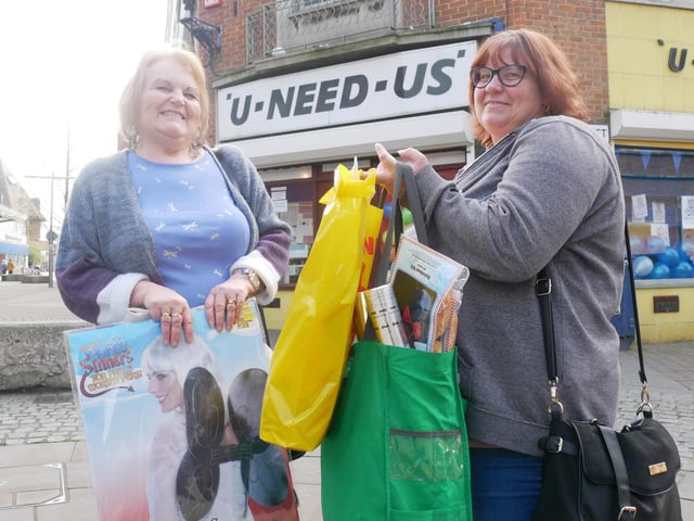 Bagging a bargain, customers Linda Brown and Lucy Parrett, pictured on the shops last day in March 2019.