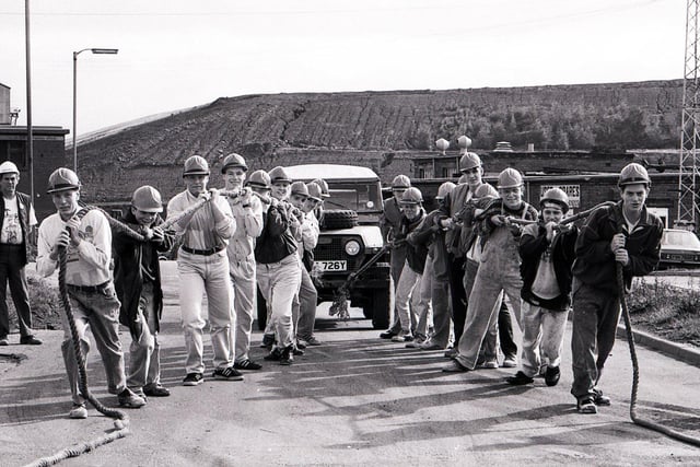 Staff from Henry Boot Limited take part in a sponsored truck pull, August 20, 1990