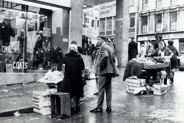 Market traders at the top end of Dixon Lane with the Brunswick Hotel in the background, November 1967