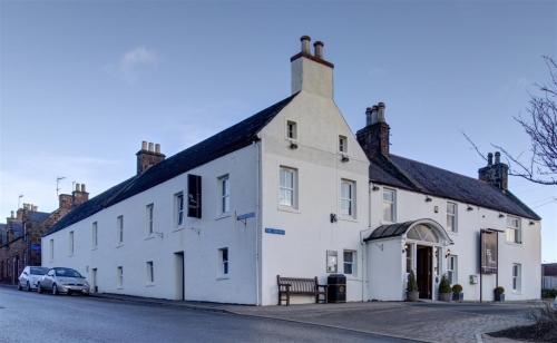 Renovated 18th century hotel in the heart of Aberdeenshire with 10 en-suite letting rooms and popular restaurant - £825,000.