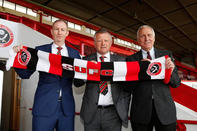 Kevin McCabe (right) with former Sheffield United manager Chris Wilder (centre) and his assistant Alan Knill ©2016 Sport Image all rights reserved