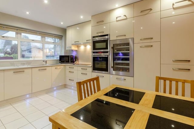 The kitchen features a range of high-specification, integrated, stainless steel appliances, including an AEG wine cooler and washing machine, Neff double electric oven and separate combination microwave with hide and slide door. Don't forget either the integrated dishwasher and fridge freezer.