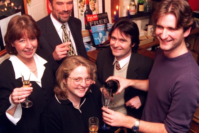 Pictured at Trippet's Wine Bar, Trippet Lane, Sheffield, where party-goers are seen drinking Cava served up by barman Bill Hilton in December 1996