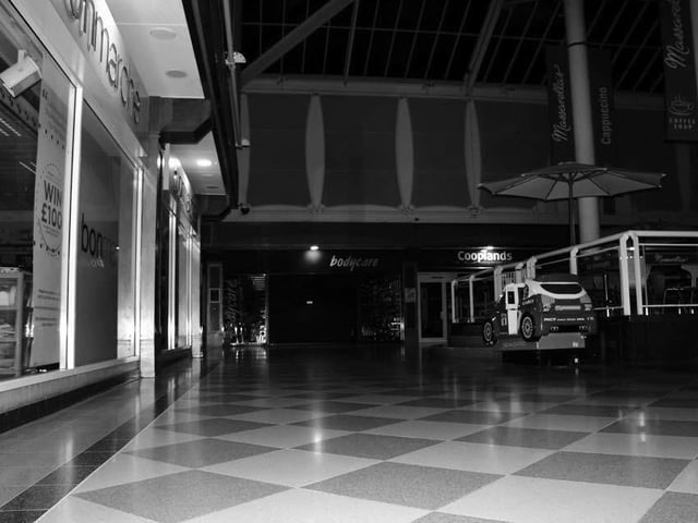 The ghostly black and white image of a haunted precinct at Sutton? Ghost buster Lee Roberts, from Sutton, was at the Idlewells Shopping Centre during an investigation in 2015. It was the venue for the world's first Facebook LIVE ghost hunt, Lee says. It is also where a mysterious lady is said to roam the building. Legend has it that she apparently used to collect the dead from the old streets that stood there long before the shopping centre was built.