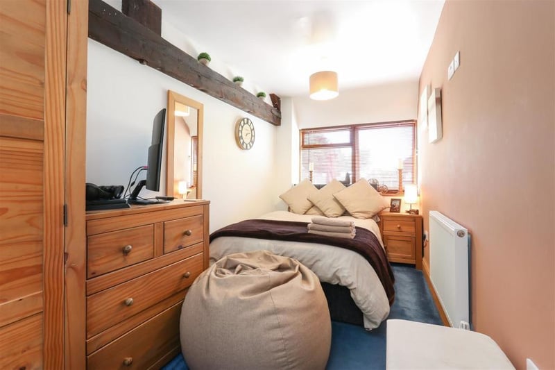 The accommodation comprises: stunning vaulted ceiling, open-plan living area with Clearview log burner, stylish dining kitchen with integrated appliances and Belfast sink, patio doors to the garden, modern bathroom with bath and overhead shower, two double bedrooms.