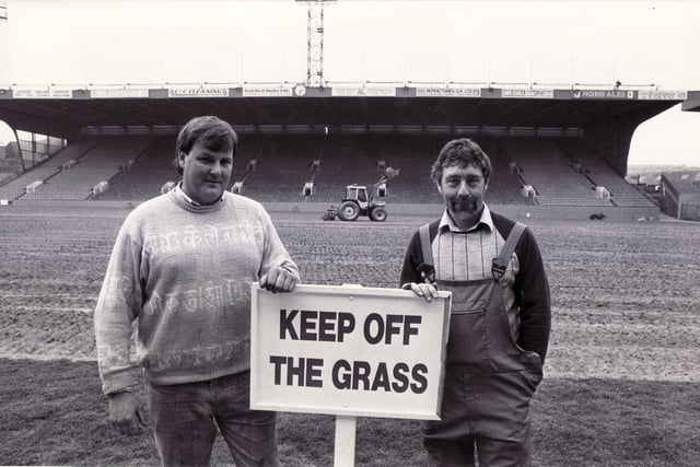 Final touches are put to the soil of the Hillsborough pitch ahead of the new season in the summer of 1988. John Hewitt of W.E. Hewitt & Son, which prepared the ground, is pictured with head groundsman, Dave Barber.