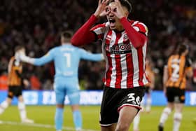 Sheffield United's Daniel Jebbison was in fine form before his red card: Andrew Yates / Sportimage