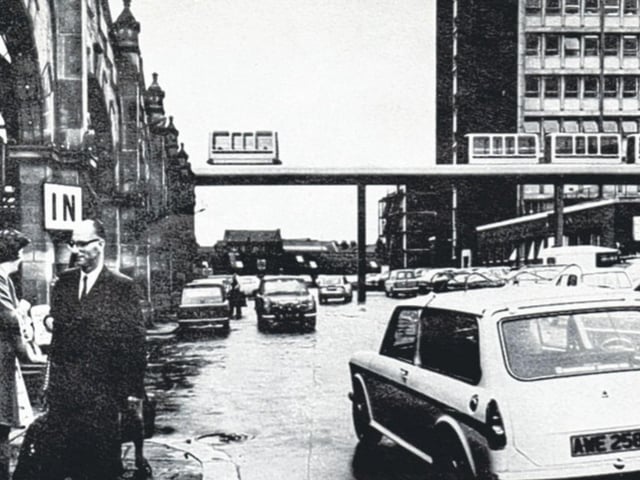 A £10 million, nine-station monorail system was proposed in Sheffield in 1973. Driverless carriages would take passengers along two miles of electrified tracks from the
Midland railway station, above the Hole In The Road, and up to Fargate before hooking past the Town Hall and descending down The Moor. Sheffield was to pilot a Government scheme for monorail networks in big places. However, criticism grew and the idea was quietly dropped.