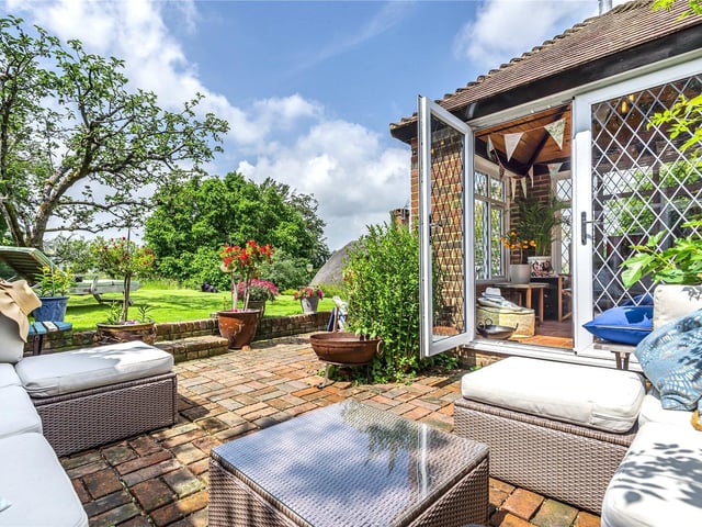 This three bedroom Grade II listed thatched cottage in Nether Wallop is on the market for £900,000. It is listed by Fine and Country.