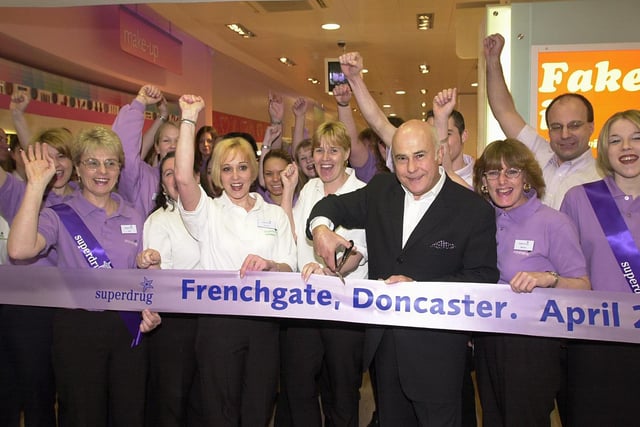 Superdrug opened its new store in the old C & A building in the Frenchgate Centre in 2001. Our picture shows top hairdresser Joshua Galvin cutting the tape, watched by cheering staff.
