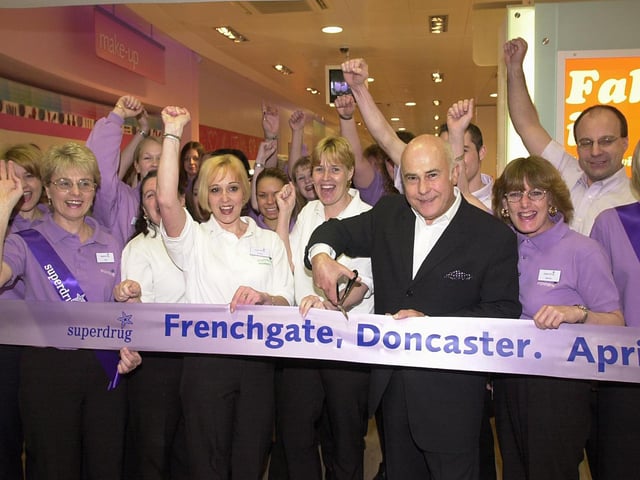 Superdrug opened its new store in the old C & A building in the Frenchgate Centre in 2001. Our picture shows top hairdresser Joshua Galvin cutting the tape, watched by cheering staff.