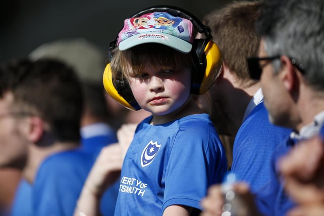 A young fan in the crowd.