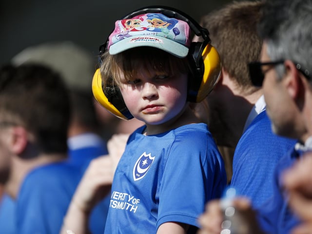 A young fan in the crowd.