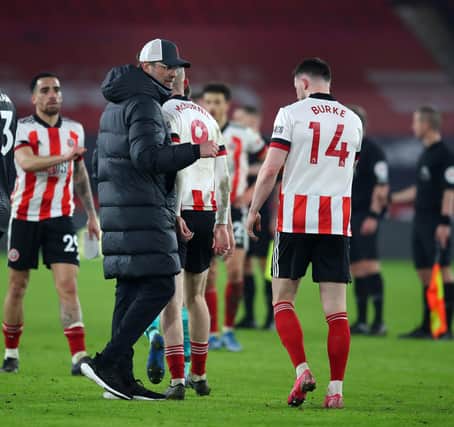 Jurgen Klopp manager of Liverpool consoles the Sheffield United players at the final whistle during the Premier League match at Bramall Lane. Simon Bellis/Sportimage