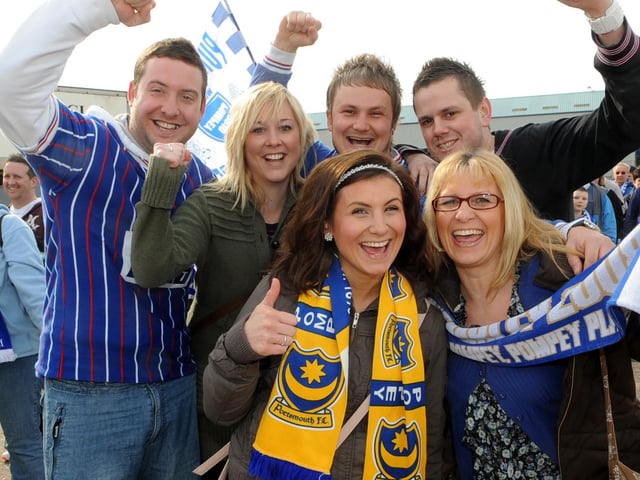 Chris Turner, Zoe Smith, Luke Swallow, Darren Good, and front Jackie Swallow and her daughter Jasmine board the bus for Wembley at Fratton Park..