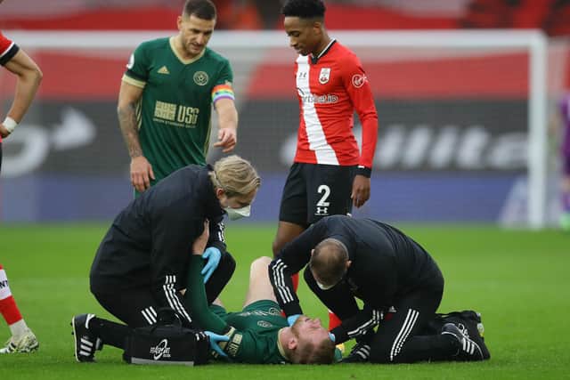 Oli McBurnie receives treatment on the pitch at Southampton: David Klein/Sportimage