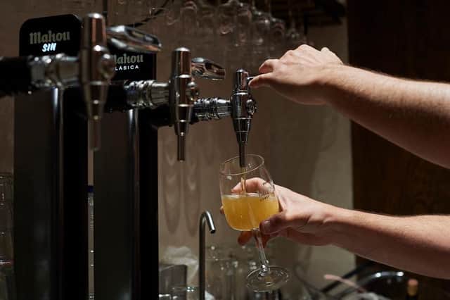 Draft lager being poured. Picture: Getty