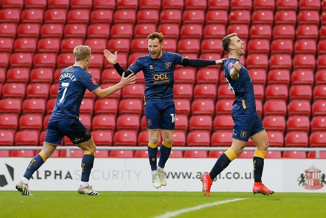 The team celebrate Rhys Oates's early opener.