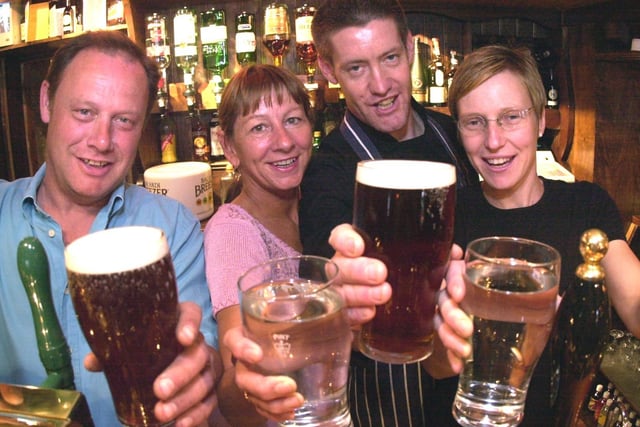 Pictured at The Dog & Partridge pub in Flouch, Sheffield, in 2003 are Steve and Audrey Marsh with Richard and Andrea Punshon