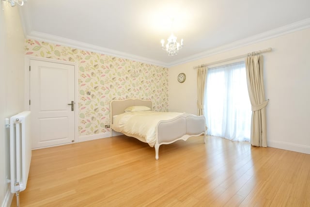 This huge five-bedroom Portsdown Hill home in Portsmouth is up for raffle. Pictured is one of the bedrooms, which measures in at 6.32m x 3.66m.