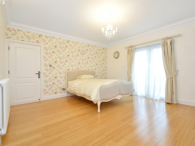 This huge five-bedroom Portsdown Hill home in Portsmouth is up for raffle. Pictured is one of the bedrooms, which measures in at 6.32m x 3.66m.