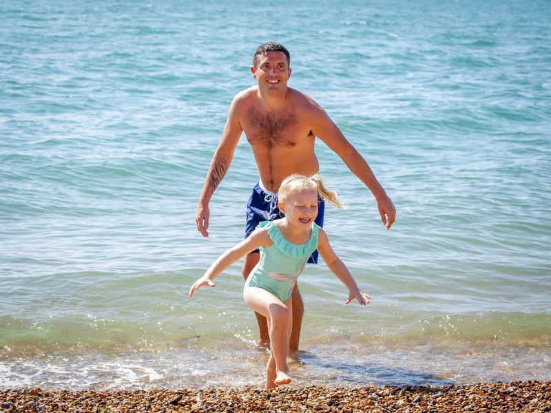 Bow 4 and her step dad, Ryan Elly having fun in the water. Picture: Habibur Rahman