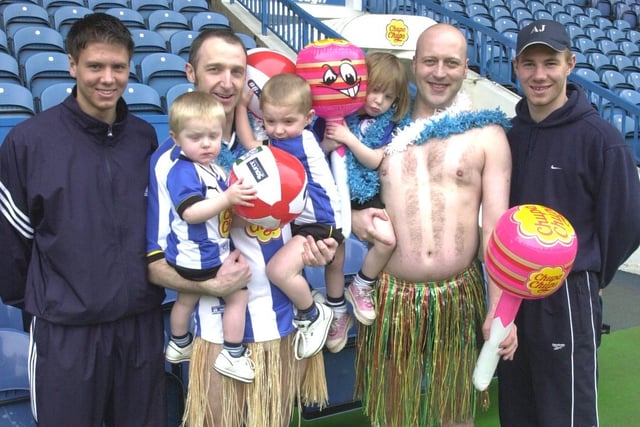 Fans and players were getting in the mood for their last game of the season in 2001, when they dressed up for a beach party. Left to right are Leigh Bromby, fan Simon Grayson with his sons Arnie 3 and Charlie 18 months, Neil Hargreaves and daughter Bethany and Chris Stringer.
