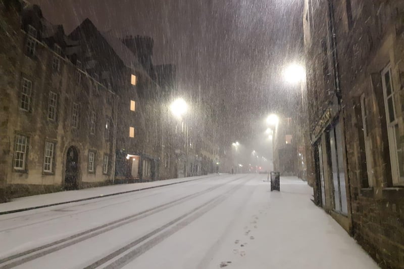 Another shot of the Royal Mile with just a single set of footprints visible in the snow as it was heavily falling last night.
