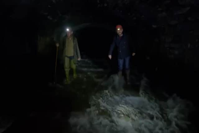Presenter Tim Dunn and Simon Ogden explore the hidden waterways beneath Sheffield railway station for the Yesterday TV show The Architecture the Railways Built (pic: UKTV)