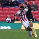 Kyron Gordon of Sheffield United tackles Tarique Fosu of Stoke City: Andrew Yates / Sportimage