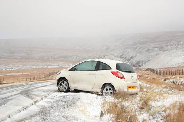 A crashed car on the Snake Pass in the Peak District in 2020 - Danny Lawson/PA Wire
