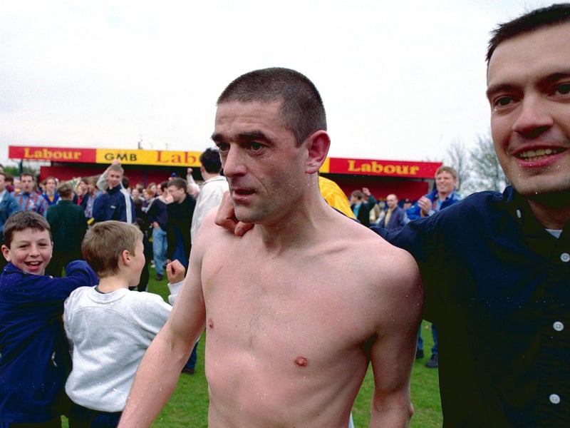 Steve Whitehall is cheered by fans.