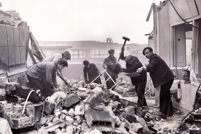 Workmen were hard at work clearing the rubble caused by the United States Airforce jet plane crash at Lodge Moor Hospital.  It was hoped the site would soon be ready for re-building, December 13, 1955