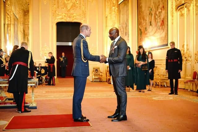 Sheffield boxing legend Johnny Nelson receives his MBE from Prince William at Windsor Castle. Submitted picture